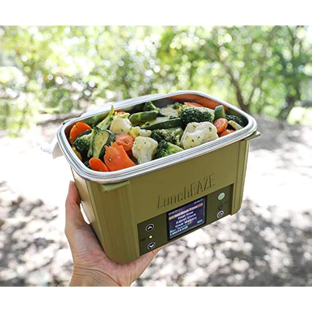 LunchEAZE meal container, placed on an office desk, without any wires, automatically heats the meal. Modern and portable design for professionals.